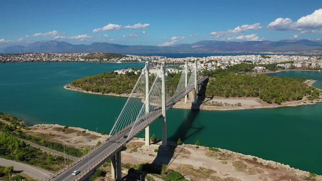 Aerial drone video of new famous public cable bridge of Halkida or Chalkida connecting mainland with Evoia island, Greece
