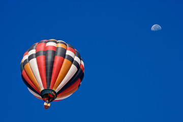 Colorful hot air balloon in morning air