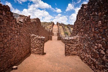 Ancient walls and buildings dating back to the Wari culture, at the Pikillacta archaeological site, just south of Cusco, Peru