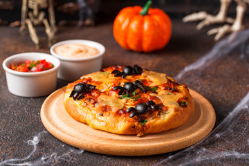 Halloween scary pizza decorated ghosts