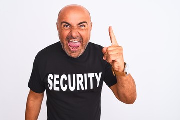 Middle age safeguard man wearing security uniform standing over isolated white background pointing...