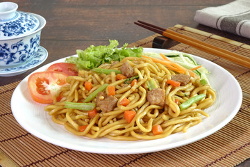 Stir fried noodles with tofu and vegetable, vegetarian food
