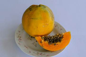 Fototapeta na wymiar Papaya In Floral Plate