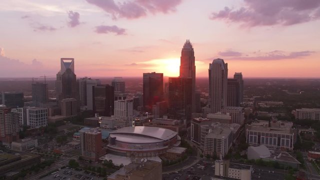 Charlotte, North Carolina circa-2019.  Aerial view of Charlotte at sunset.  Shot from helicopter with Cineflex gimbal and RED 8K camera.