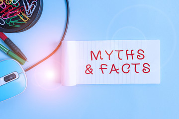 Handwriting text Myths And Facts. Conceptual photo usually traditional story of ostensibly...