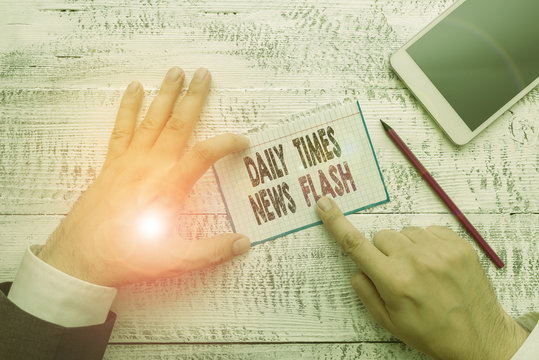 Writing note showing Daily Times News Flash. Business concept for fast response to actions happened in article way