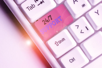 Word writing text 24 Or 7 Support. Business photo showcasing Giving assistance to service whole day and night No downtime White pc keyboard with empty note paper above white background key copy space