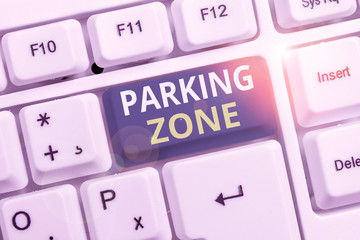 Conceptual hand writing showing Parking Zone. Concept meaning a space where an automobile can be parked Allowed to parked White pc keyboard with note paper above the white background