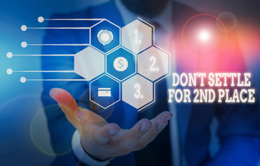 Writing note showing Don T Settle For 2Nd Place. Business concept for you can be the first dont stop here Male wear formal suit presenting presentation smart device