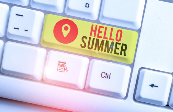 Text sign showing Hello Summer. Business photo showcasing season after spring and before autumn where the weather is hot White pc keyboard with empty note paper above white background key copy space