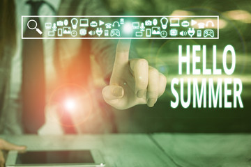 Writing note showing Hello Summer. Business concept for season after spring and before autumn where the weather is hot Woman wear formal work suit presenting presentation using smart device