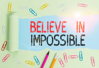 Conceptual hand writing showing Believe In Impossible. Concept meaning You can do it everything is possible Work hard