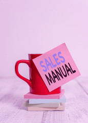 Handwriting text Sales Manual. Conceptual photo set of printed materials containing product...