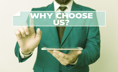 Handwriting text Why Choose Us Question. Conceptual photo Reasons for choosing our brand over others arguments Businessman with pointing finger in front of him