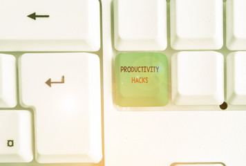 Word writing text Productivity Hacks. Business photo showcasing tricks that you get more done in the same amount of time White pc keyboard with empty note paper above white background key copy space