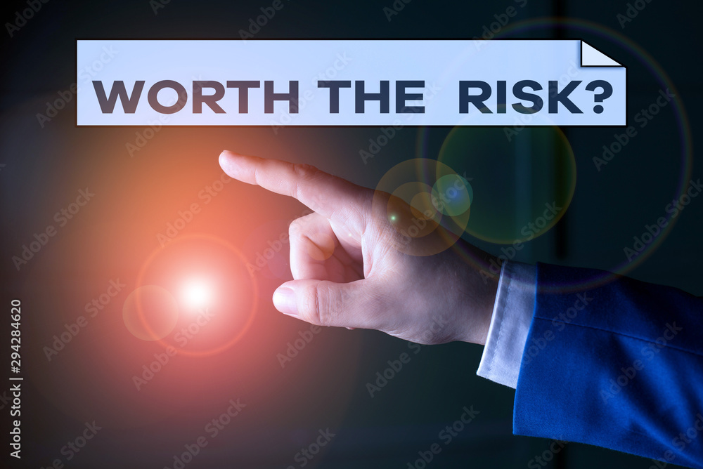Poster writing note showing worth the risk question. business concept for asking if certain action balanced