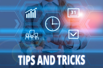 Writing note showing Tips And Tricks. Business concept for piece of inside facts specially in...