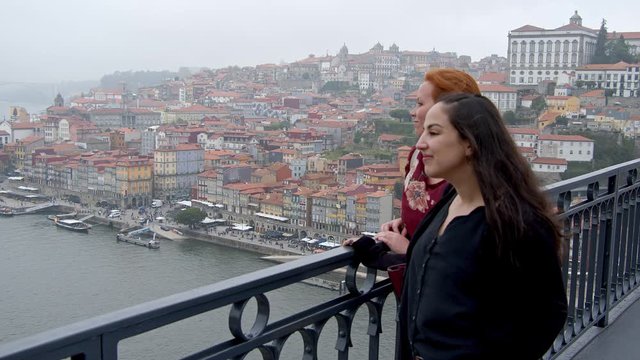 Two women on a sightseeing trip to Porto in Portugal - travel photography