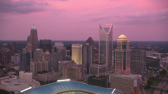Charlotte, North Carolina circa-2019.  Aerial view of Charlotte at sunset.  Shot from helicopter with Cineflex gimbal and RED 8K camera.