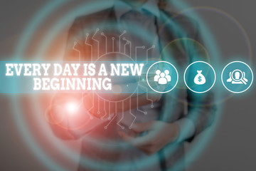 Writing note showing Every Day Is A New Beginning. Business concept for you have a chance to dream work live better Woman wear formal work suit presenting presentation using smart device