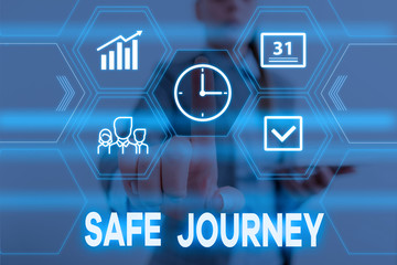 Fototapeta premium Conceptual hand writing showing Safe Journey. Concept meaning polite way of wishing someone a safe journey or Safe Travel Woman wear work suit presenting presentation smart device