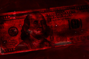 bloody business concept: 100 dollars banknote in a pool of blood - obrazy, fototapety, plakaty