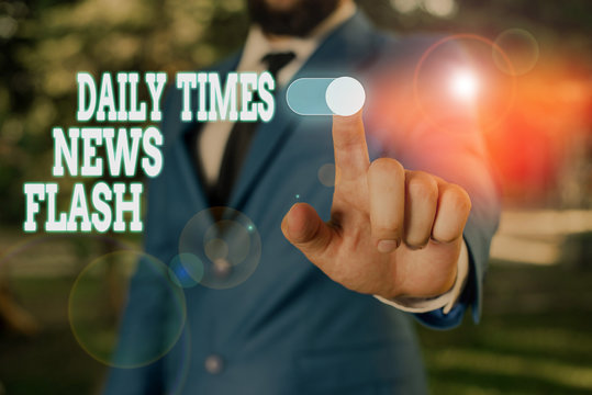 Text sign showing Daily Times News Flash. Business photo text fast response to actions happened in article way Male human wear formal work suit presenting presentation using smart device