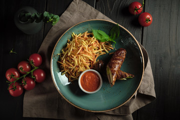 Fototapeta na wymiar Meatloaf with potatoes straws . catering menu