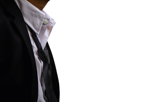 Man in white shirt taking off necktie on white background with copy space.
