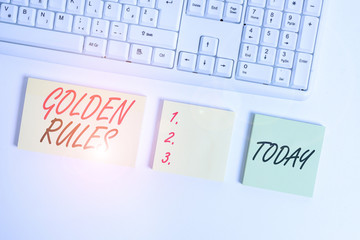 Word writing text Golden Rules. Business photo showcasing basic principle that should always follow to ensure success Flat lay above blank copy space sticky notes with business concept