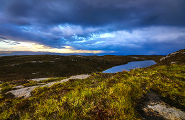 Beautiful scenic landscape of Scotland nature with beautiful evening sun set sky.