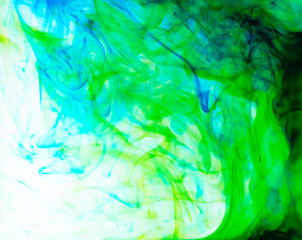Food color drop and dissolve in water for abstract and background.