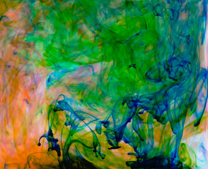 Food color drop and dissolve in water for abstract and background.