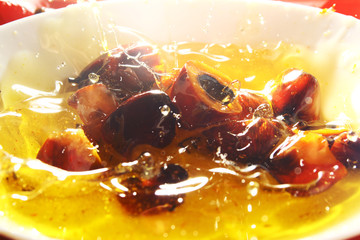 Fototapeta na wymiar Palm oil is an edible vegetable oil derived from the mesocarp of the fruit of the oil palms