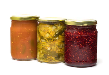 Fototapeta na wymiar Jars with pickled vegetables isolated on white 
