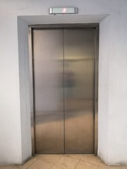 Passenger elevator doors in the building