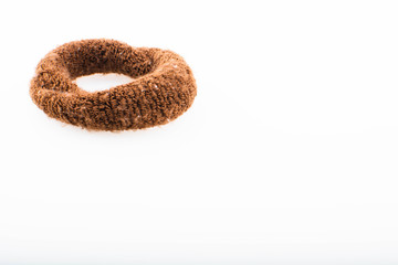 Close-up brown hair band isolated on a white background