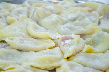 Fototapeta na wymiar varenyky pierogi dumplings ravioli with wild strawberry Ukrainian traditional food close-up