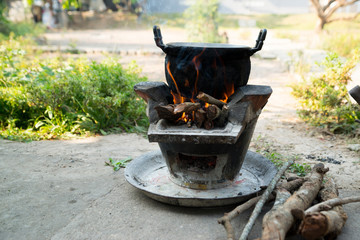 Old cooking pot stove using firewood As fuel.