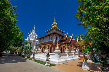 background,Open view of the temple at Dara Pirom Temple (Mae Rim),which has a large statue in front of the temple. Covered by trees and sky, Chiang Mai Province, Thailand, Wat Pa Daphirom