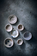 Different handmade ceramic on background..