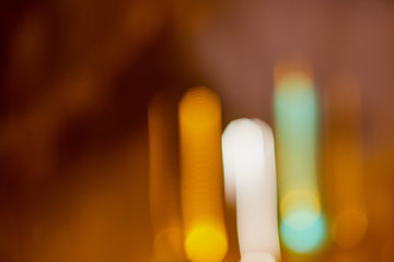 Abstract texture with blurred light yellow line and black background