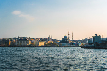 Fototapeta na wymiar April 17, 2019 : View of Istanbul cityscape Suleymaniye Mosque Hagia Sophia with floating tourist boats in Bosphorus ,Istanbul Turkey