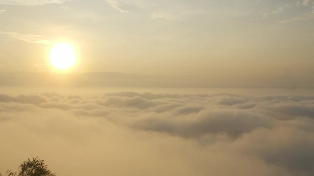Morning mood and fog on mountain and sun with colorful clouds beatiful. Landscape sea fog and Sunrise Khao Phra Ya Dern Thong View Point. Phatthana Nikhom, Lopburi Thailand