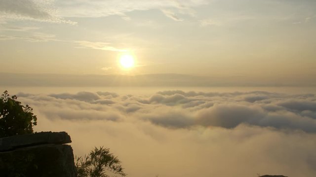 Morning mood and fog on mountain and sun with colorful clouds beatiful. Landscape sea fog and Sunrise Khao Phra Ya Dern Thong View Point. Phatthana Nikhom, Lopburi Thailand