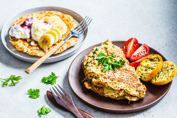 Oatmeal omelet with cheese and sweet oatmeal pancake. Healthy breakfast concept.