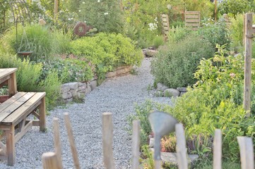 Gravel path in country garden setting © studio4542