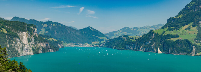 Panoramic view on green Swiss Alps near lake Lucerne