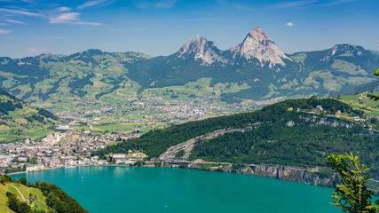 Fototapeta premium Panoramic view on green Swiss Alps near lake Lucerne, Morchach and Mythens mountains