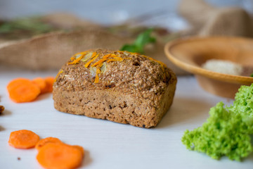 Dietary bread without yeast from whole grain flour. Healthy food, bread with vegetables and bran.